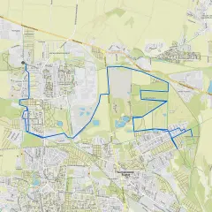 Mapa z zaznaczoną trasą rowerową w Siemianowicach Śląskich, prowadzącą przez parki i tereny zielone.