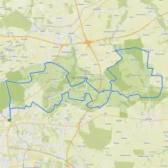 Mapa z zaznaczoną trasą rowerową wokół Łodzi, przechodzącą przez tereny zielone i miejscowości.