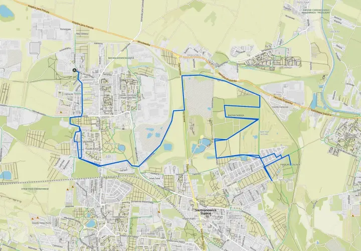 Mapa z zaznaczoną trasą rowerową w Siemianowicach Śląskich, prowadzącą przez parki i tereny zielone.