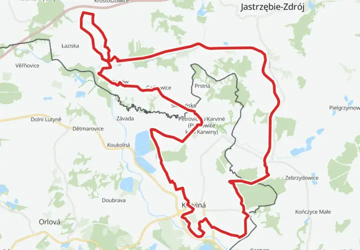 Mapa szlaku rowerowego wokół Karwiny i Jastrzębia-Zdroju. Trasa, oznaczona na czerwono, prowadzi przez Łaziska, Petrovice i Doubravę.