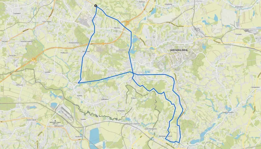 Mapa z zaznaczoną trasą rowerową wokół Wodzisławia Śląskiego, prowadzącą przez okoliczne miejscowości i tereny zielone.