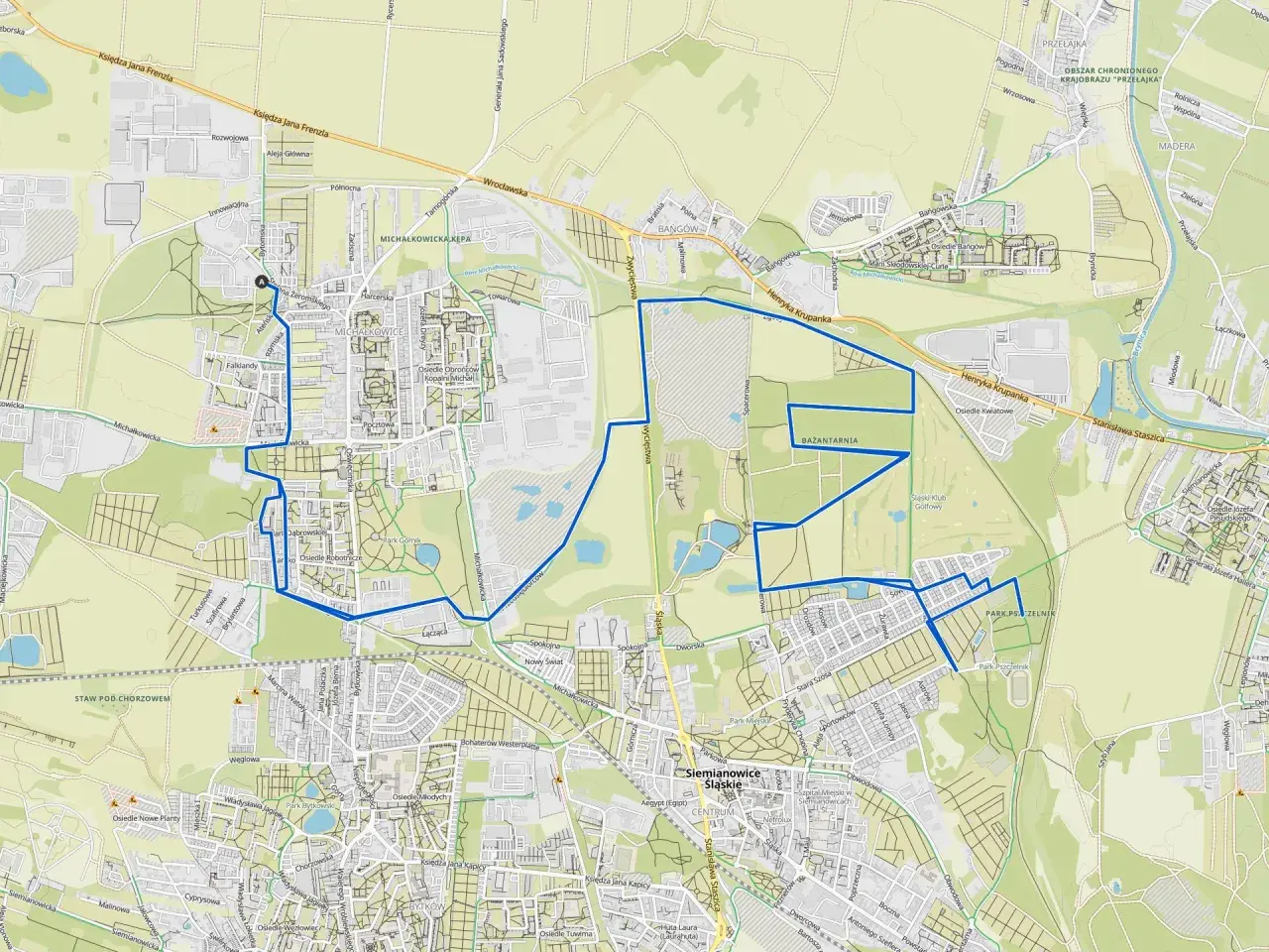 Mapa z zaznaczoną trasą rowerową w Siemianowicach Śląskich, prowadzącą przez parki i tereny zielone.