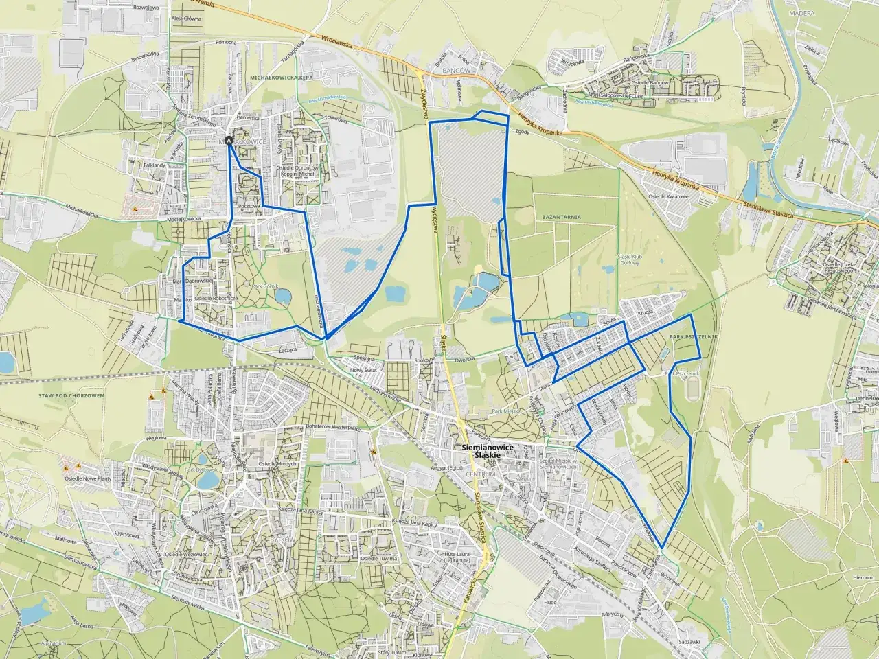 Mapa z zaznaczoną trasą rowerową w Siemianowicach Śląskich, prowadzącą przez parki i tereny zielone.